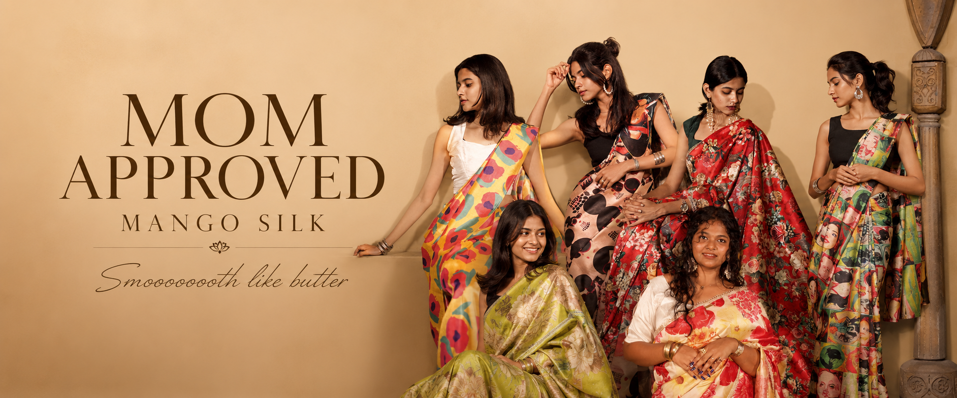 A promotional banner featuring Seven women modeling colorful patterned sarees against a warm beige background with the text 'MOM APPROVED MANGO SILK' and 'Silk smootheth like butter'.